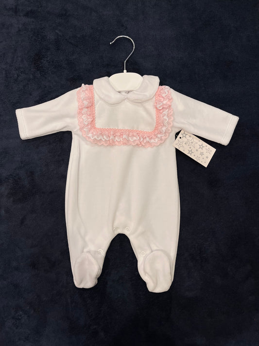 Girls white velour suit with pink frill chest.