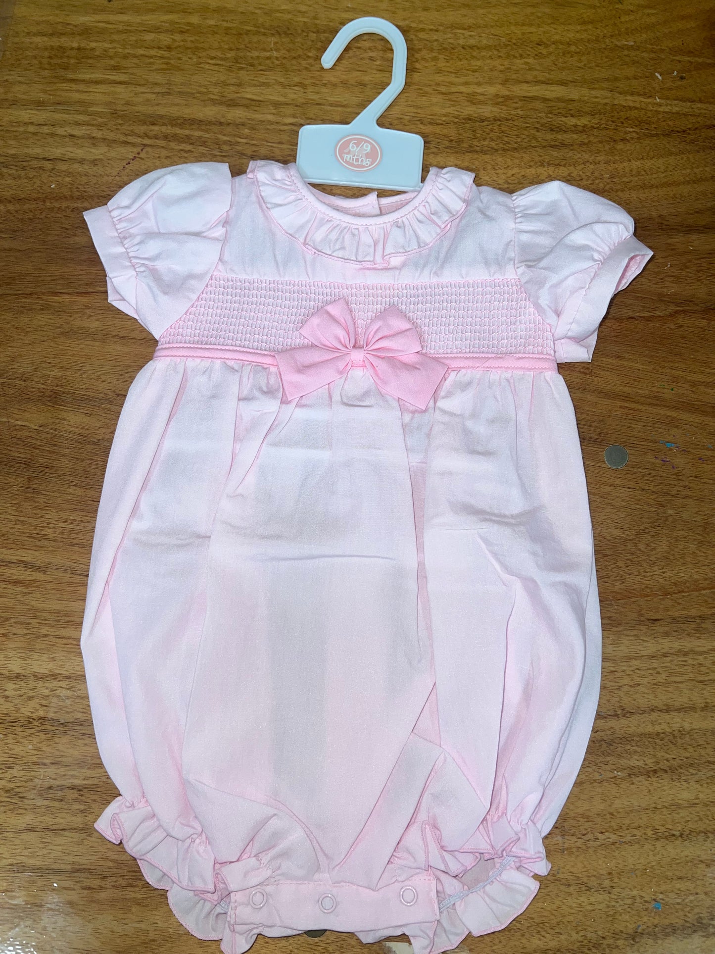 Pink frill bow romper